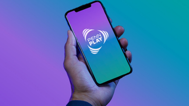 a hand holding a phone