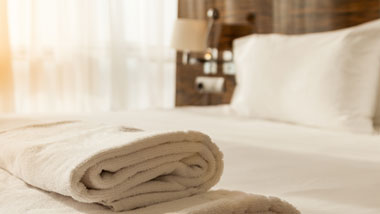 towels on hotel bed